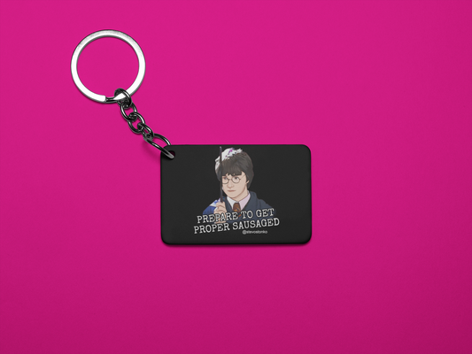 PREPARE TO GET PROPER SAUSAGED Keyring by Stevo